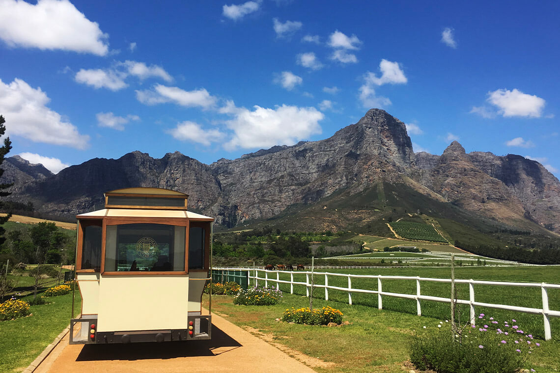 The Franschhoek wine tram is a great way to explore the surrounding winelands