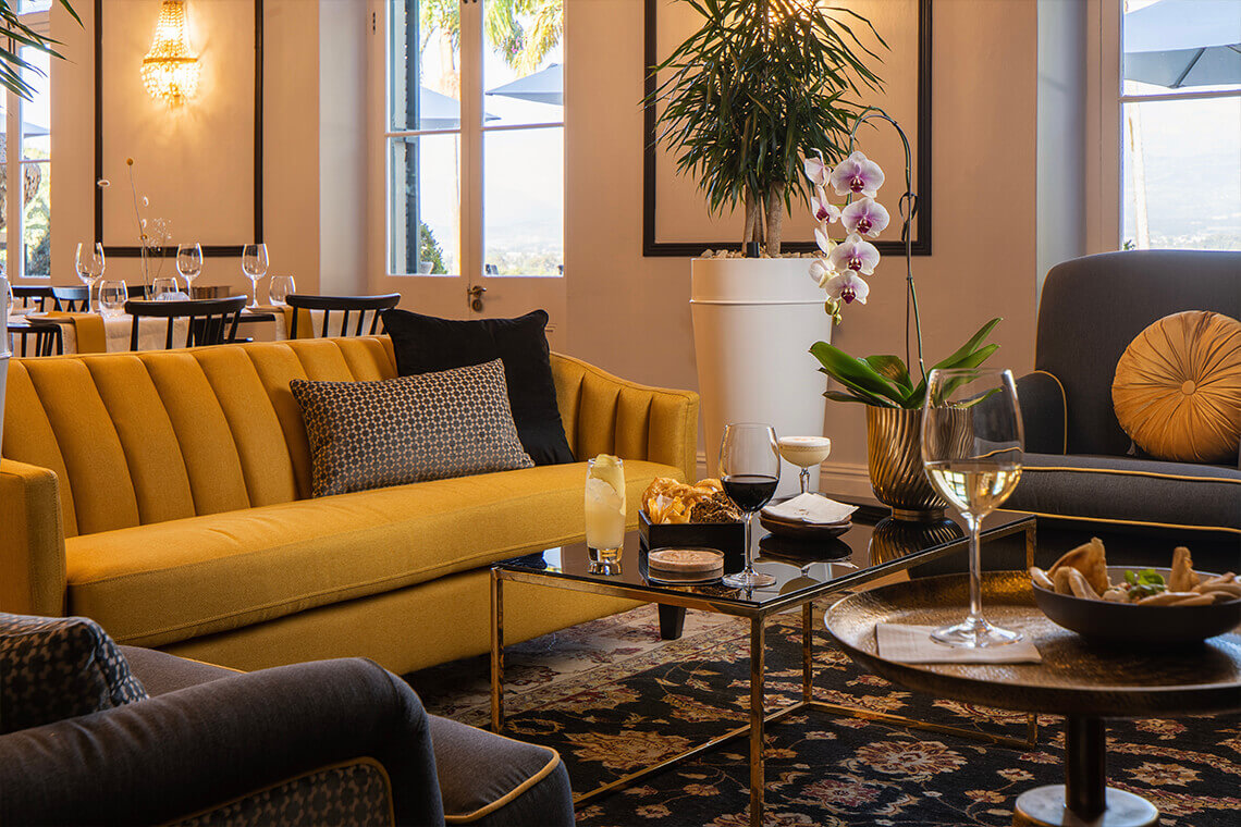 Enjoy a glass of wine from their extensive wine list in the grand lounge