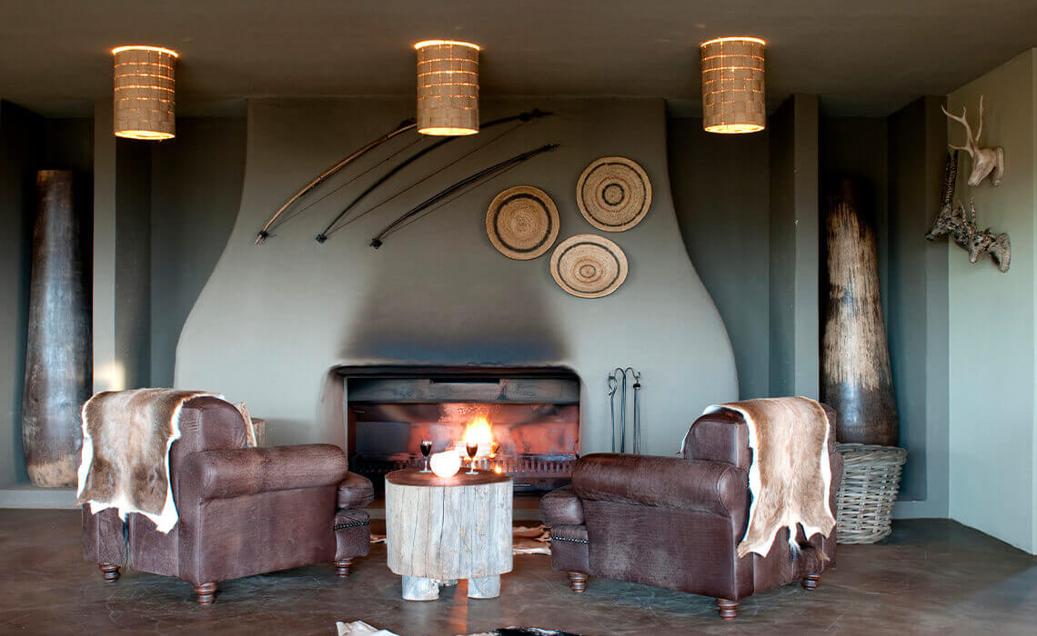 Kwena Lodge bar and fireplace