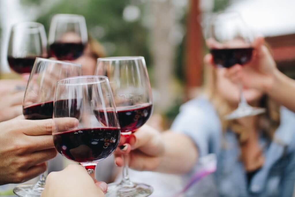 many people drinking south african red wine